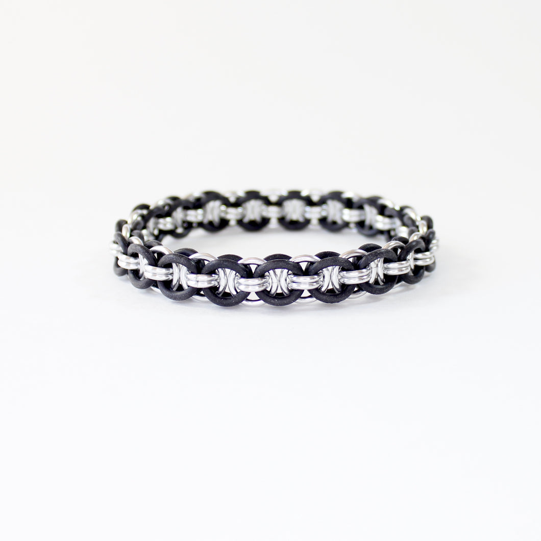 The Helm Stretch Bracelet in Black + Silver