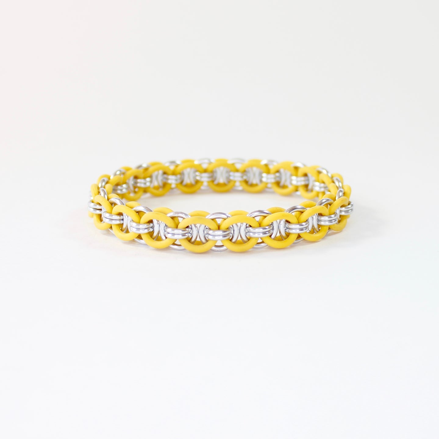The Helm Stretch Bracelet in Yellow + Silver